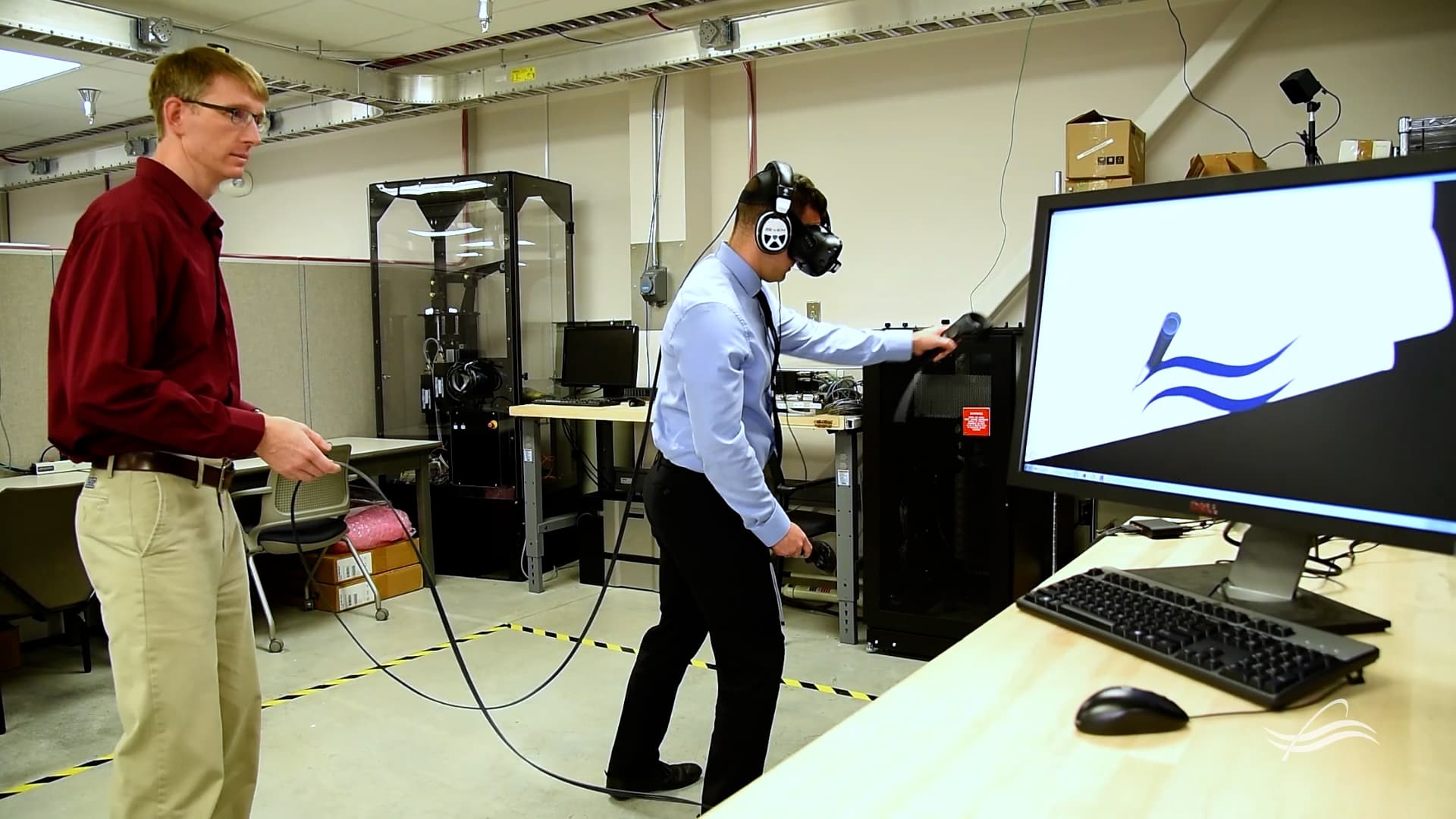 Two men experimenting with virtual reality