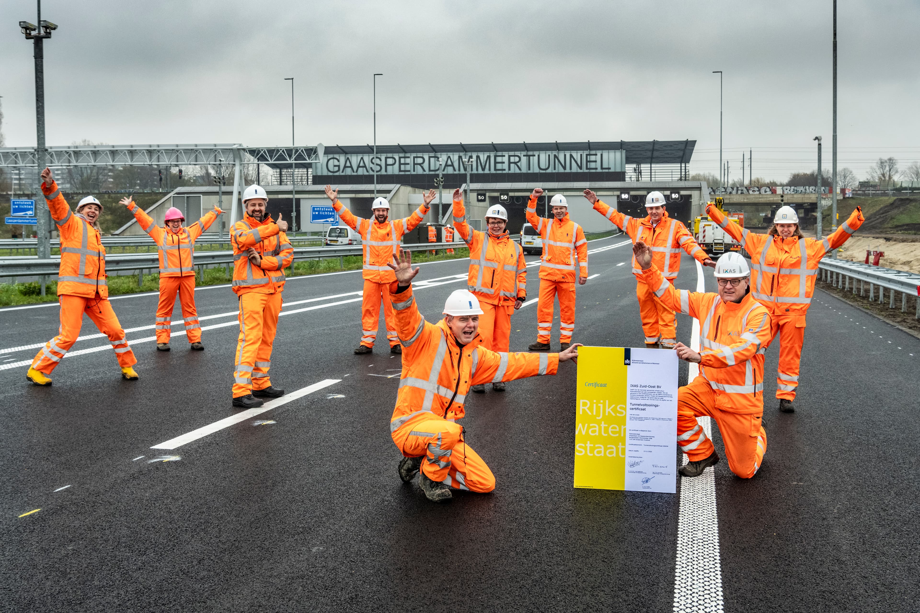 Workers celebrating completion of project